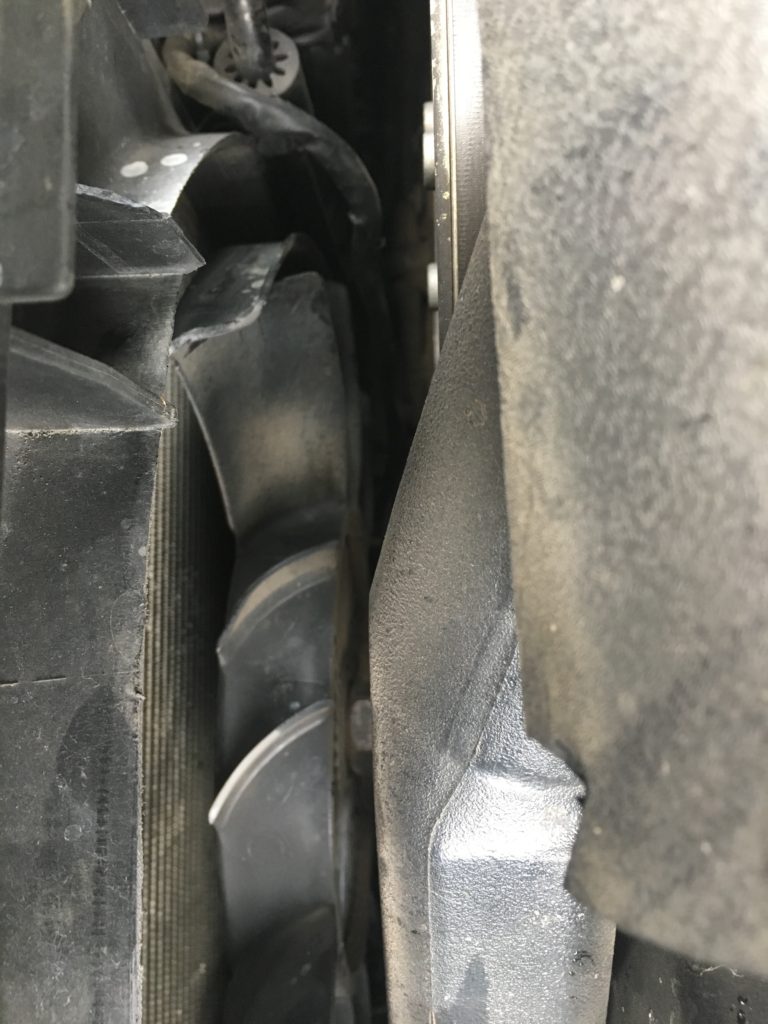 Broken blades of the radiator fan
